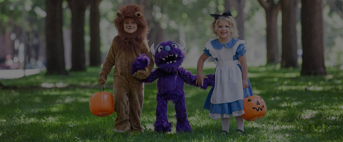 Two Children Holding Hands with Monster